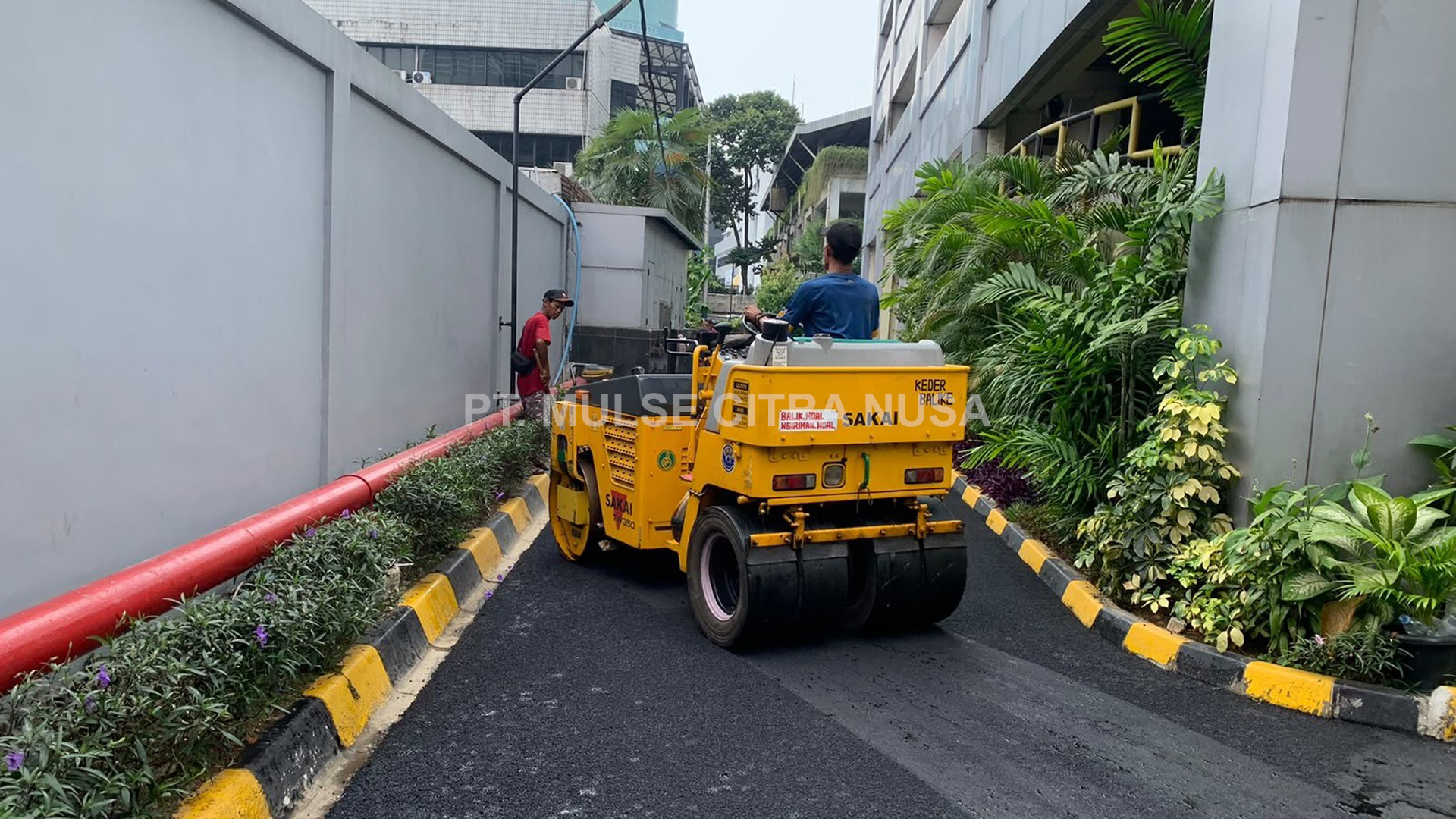 Pengaspalan Akses Jalan